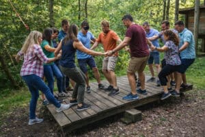 Gruppe beim Teambuilding-Event auf der Team-Wippe